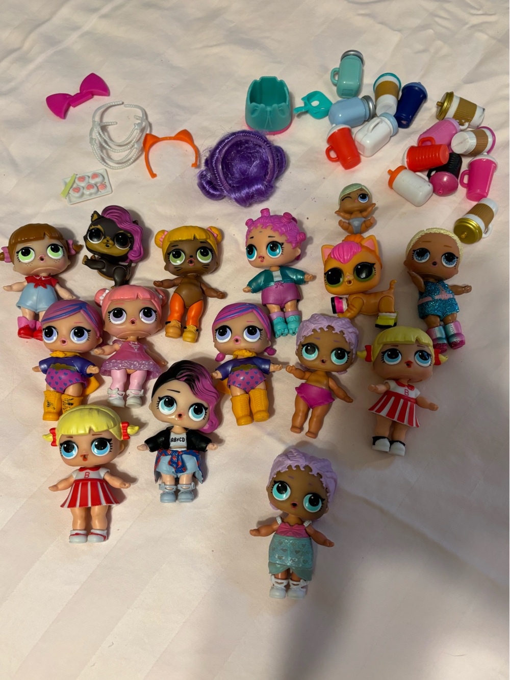 Lot of Lol dolls and accessories